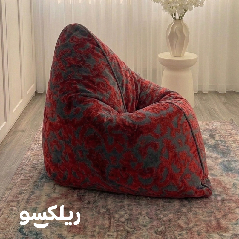 چیدمان بین بگ لاکچری اسلیمی در دکوراسیون منزل؛ مبل شنی تک نفره پشتی دار مخملی ریلکسو